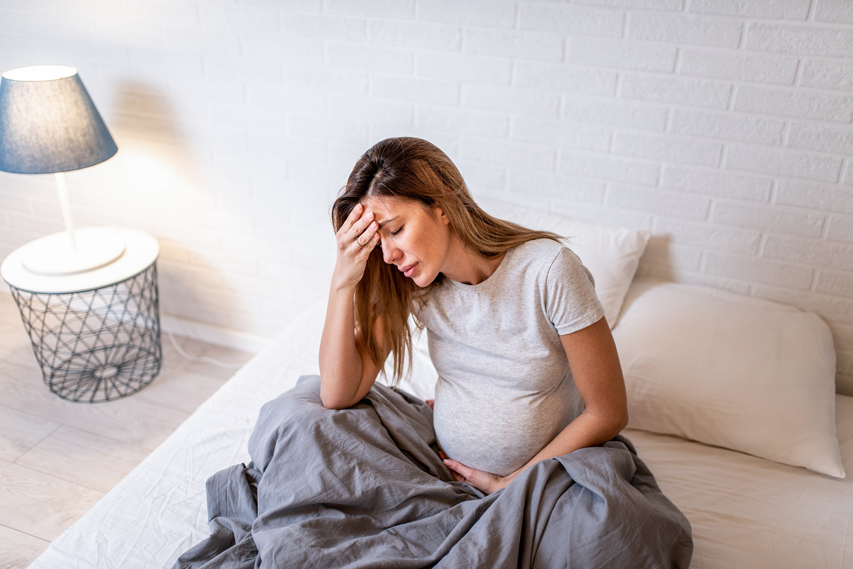 Ból głowy w ciąży – przyczyny i leczenie / istock